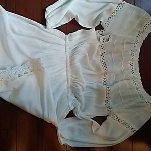 White long sleeve romper .new with tags